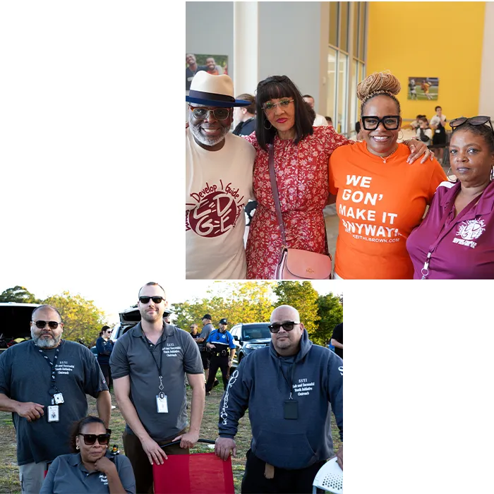 Community members posing at outreach event